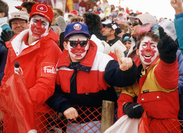 Canadian fans cheer in the crowd at the 1988 Winter Olympics in Calgary. (CP PHOTO/COA/ T. O'lett)