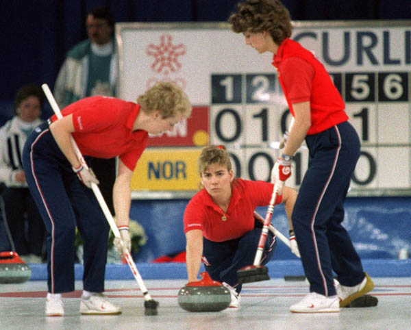 (From left) Canada's  Lindsay Sparkes, Debbie Jones and Penny Ryan compete in the curling event at the 1988 Calgary Olympic winter Games. (CP PHOTO/COA/Ted Grant)