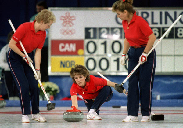 (From left) Canada's Lindsay Sparkes, Penny Ryan and  Linda Moore compete in the curling event at the 1988 Calgary Olympic winter Games. (CP PHOTO/COA/Ted Grant)