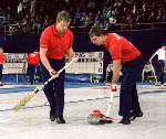 Canada's Neil Houston and Brent Syme compete in the curling event at the 1988 Calgary Olympic winter Games. (CP PHOTO/COA/Ted Grant)