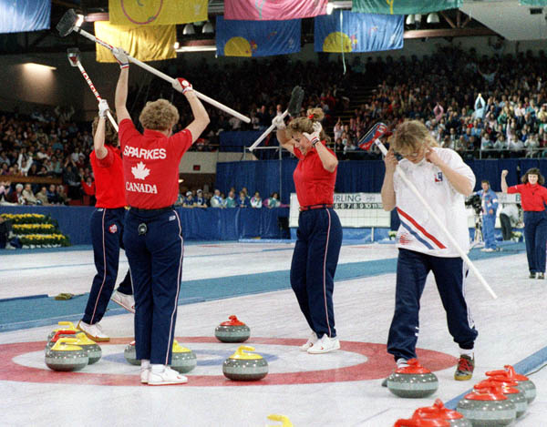 (From left to far right) Canada's Penny Ryan, Lindsay Sparkes, Debbie Jones and  Linda Moore compete in the curling event at the 1988 Calgary Olympic winter Games. (CP PHOTO/COA/Ted Grant)