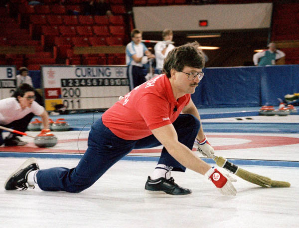 Canada's Edward Lukowich competes in the curling event at the 1988 Calgary Olympic winter Games. (CP PHOTO/COA/Ted Grant)