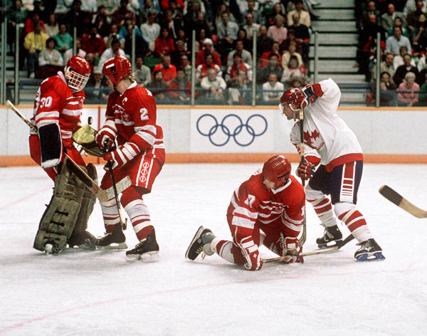 Canada's hockey team plays Switzerland at the 1988 Winter Olympics in Calgary. (CP PHOTO/ COA/ S.Grant)