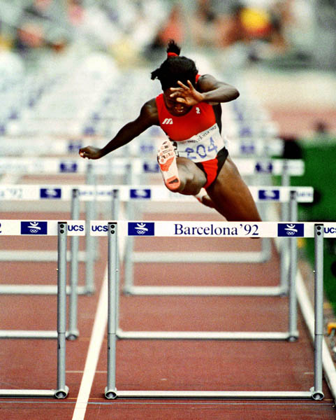 Canada's Katie Anderson competes in the 100m hurdles event at the 1992 Barcelona Summer Olympic Games. (CP PHOTO/COA/Claus Andersen)
