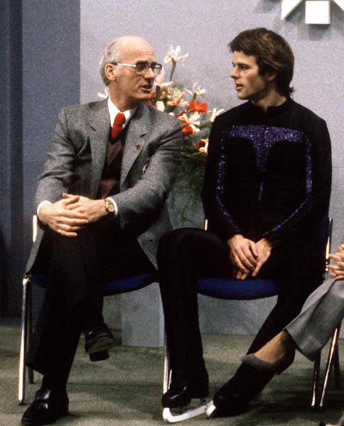 Canada's Gary Beacom (right) and his coach Norris Bowden wait for results in the figure skating event at the 1984 Sarajevo Winter Olympics.  (CP PHOTO/ COA/ Crombie McNiel)