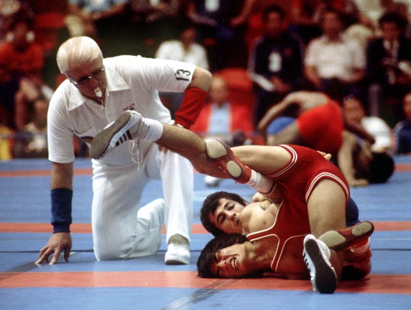 Canada's Mitch Kawasaki (red) competes in the wrestling event at the 1976 Olympic games in Montreal. (CP PHOTO/ COA/RW)