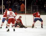 Canada's James Patrick (9) and Mario Gosselin (goalie) compete in hockey action against the United States at the 1984 Winter Olympics in Sarajevo. (CP PHOTO/ COA/O. Bierwagon )