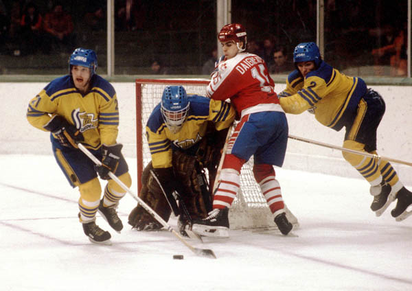 Jean-Jacques Daigneault (#15) competes in hockey action against Sweden at the 1984 Winter Olympics in Sarajevo. (CP PHOTO/ COA/O. Bierwagon )