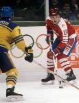 Canada's Dave Gagner (19) looks towards teammate Russ Courtnall (foreground) during hockey action against Sweden at the 1984 Winter Olympics in Sarajevo. (CP PHOTO/ COA/O. Bierwagon )