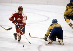 Canada's Craig Redmond competes in hockey action against the United States at the 1984 Winter Olympics in Sarajevo. (CP PHOTO/ COA/O. Bierwagon )