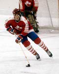 Canada's Craig Redmond competes in hockey action against the United States at the 1984 Winter Olympics in Sarajevo. (CP PHOTO/ COA/O. Bierwagon )