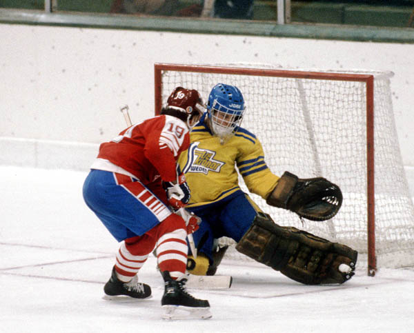Canada's Dave Gagner (19) tries to put on past the Sweden goalie during hockey action at the 1984 Winter Olympics in Sarajevo. (CP PHOTO/ COA/O. Bierwagon )