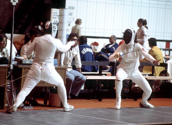 Canada's Fleurette Campeau (left) competes in the fencing event at the 1976 Olympic games in Montreal. (CP PHOTO/ COA/ BB)