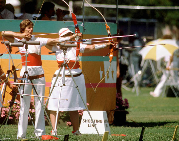 Canada's Linda Kazienko (left) competes in the archery event at the 1984 Olympic Games in Los Angeles. (CP Photo/ COA/Tim O'lett)
