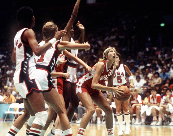 Canada's Alison Lang (right) looks up to the backet during women's basketball action at the 1984 Olympic Games in Los Angeles. (CP PHOTO/COA/JM)