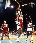 Canada's Alison Lang (centre) jumps during women's basketball action at the 1984 Olympic Games in Los Angeles. (CP PHOTO/COA/JM)