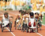 Canada's Andre Viger (front) competes in a wheelchair event at the 1984 Olympic games in Los Angeles. (CP PHOTO/ COA/J Merrithew )