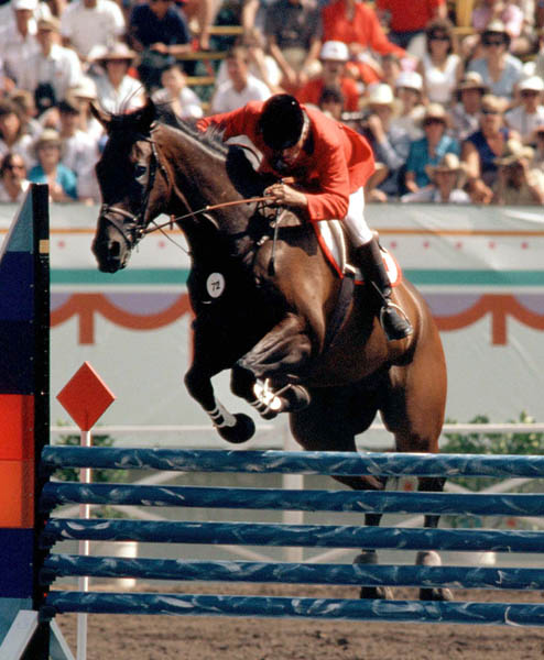 Canada's Jim Elder rides Shawline in an equestrian event at the 1984 Olympic games in Los Angeles. (CP PHOTO/ COA/Tim O'lett)