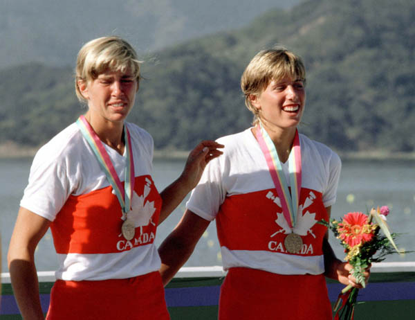 Canada's Daniele (left) and Silken Laumann celebrate a their bronze medal win in the 2x rowing event at the 1984 Olympic games in Los Angeles. (CP PHOTO/ COA/Ted Grant)