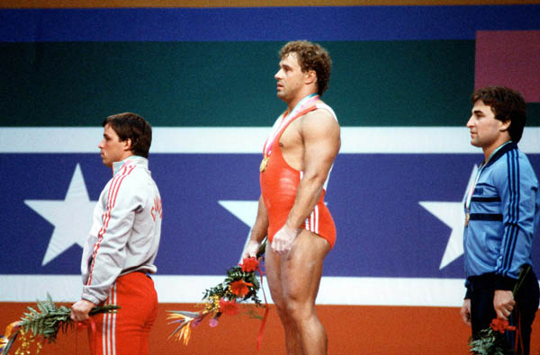 Canada's Jacques Demers (left) celebrates a silver medal win in weightlifting at the 1984 Olympic games in Los Angeles. (CP PHOTO/ COA/)