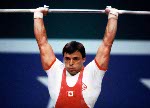 Canada's Michel Pietracupa executes a lift in the weightlifting event at the 1984 Olympic games in Los Angeles. (CP PHOTO/ COA/Tim O'lett )