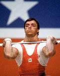 Canada's Michel Pietracupa executes a lift in the weightlifting event at the 1984 Olympic games in Los Angeles. (CP PHOTO/ COA/Tim O'lett )