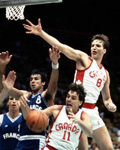 Canada's Gerald Kazanowski (8) and Gord Herbert (11) play basketball at the 1984 Olympic Games in Los Angeles. (CP PHOTO/COA/J. Merrithew)