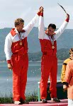 Canada's Hugh Fisher (second from right) and Alwyn Morris (right) celebrate a bronze medal win in the men's kayak K-2 event at the 1984 Olympic games in Los Angeles. (CP PHOTO/ COA/)