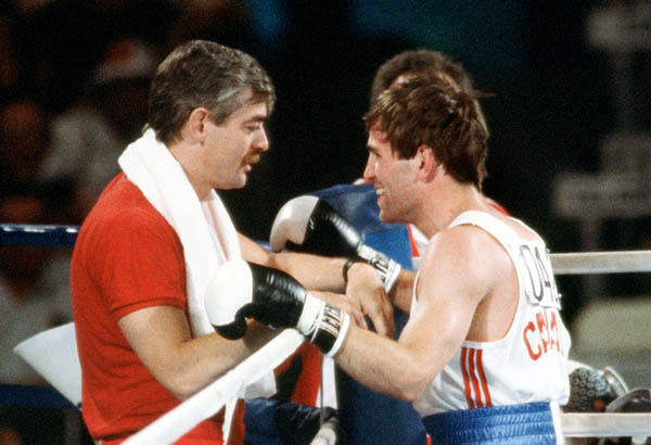 Canada's John Kalbhenn (right) competes in a boxing event at the 1984 Olympic games in Los Angeles. (CP PHOTO/ COA/ Tim O'lett)