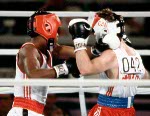 Canada's John Kalbhenn (right) competes in the boxing event at the 1984 Olympic games in Los Angeles. (CP PHOTO/ COA/ Tim O'lett)