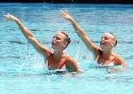 Canada's Kelly Kryczka (right) and Sharon Hambrook celebrate a silver medal win in the synchronized swimming event at the 1984 Olympic games in Los Angeles. (CP PHOTO/ COA/Tim O'lett)