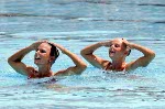 Canada's Sharon Hambrook (right) and Kelly Kryczka perform their synchronized swimming routine at the 1984 Los Angeles Olympic Games. (CP Photo/ COA/ Tim O'lett)