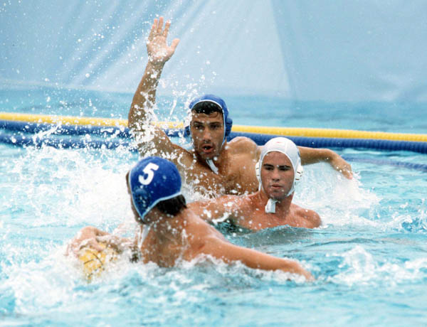 Canada's John Anderson (right) competes in the men's water polo event at the 1984 Olympic Games Los Angeles. (CP Photo/COA/Tim O'lett)