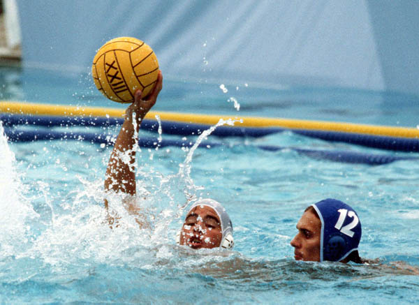 Canada's John Anderson (left) competing in the men's water polo event at the 1984 Olympic Games Los Angeles. (CP Photo/COA/Tim O'lett)