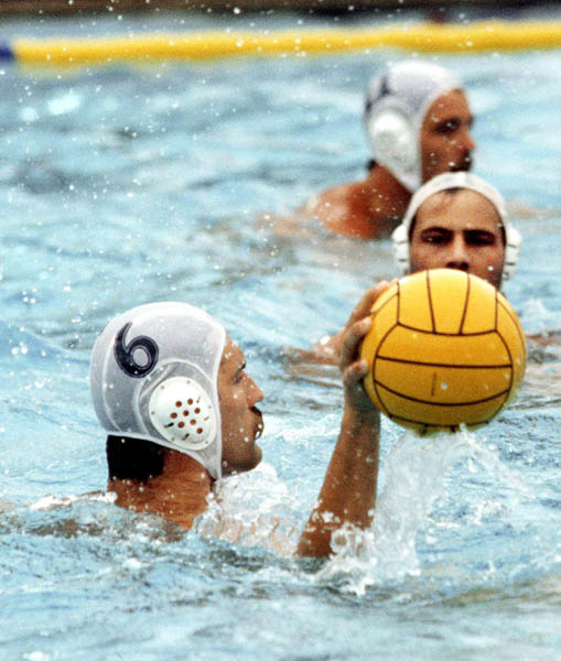Canada's Paul Pottier (front) competes in the men's water polo event at the 1984 Olympic Games Los Angeles. (CP Photo/COA/Tim O'lett)