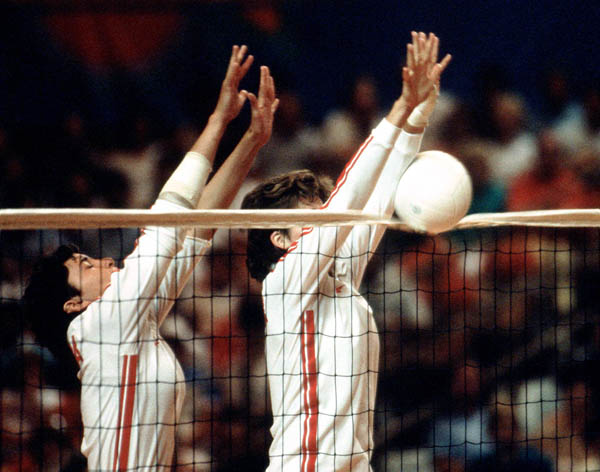 Canada's Lise Martin (left) and Diane Ratnik compete in the women's volleyball event at the 1984 Los Angeles Summer Olympic Games. (CP PHOTO/COA/Scott Grant)