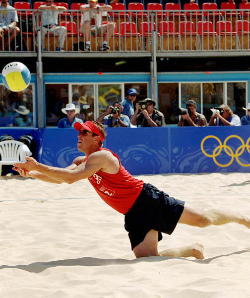 Canada's Mark Heese dives for the ball during beach volleyball action at the 2000 Sydney Olympic Games. (CP Photo/ COA)