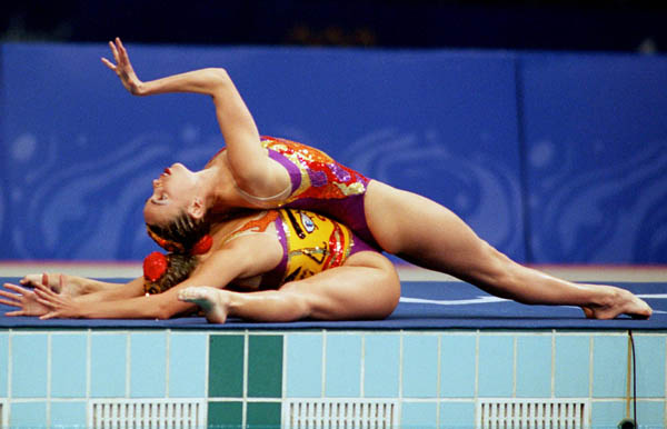 Canada's Claire Carver-Dias and Fanny Letourneau begin their synchronized swimming routine at the Sydney 2000 Olympic Games(CP PHOTO/ COA)