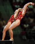 Canada's diving team, Emilie Heymans and Anne Montminy (left) , celebrates their silver medal win in the synchronized diving event at the 2000 Sydney Olympic games. (CP PHOTO/ COA)