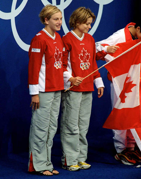 Canada's diving team, Emilie Heymans (left) and Anne Montminy, celebrates their silver medal win in the synchronized diving event at the 2000 Sydney Olympic games. (CP PHOTO/ COA)