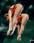 Canada's Emilie Heymans and Anne Montminy perform a well timed synchronized dive at the Sydney 2000 Olympic Games. (CP PHOTO/ COA)