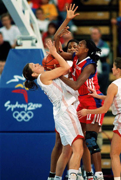 Canada's Diane Norman (left) participates in women's basketball action at the Sydney 2000 Olympic Games. (CP PHOTO/ COA)