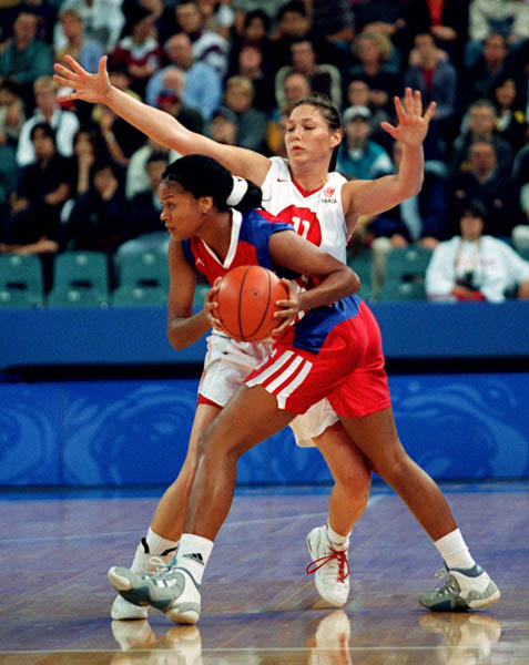 Canada's Diane Norman (11) participates in women's basketball action at the Sydney 2000 Olympic Games. (CP PHOTO/ COA)