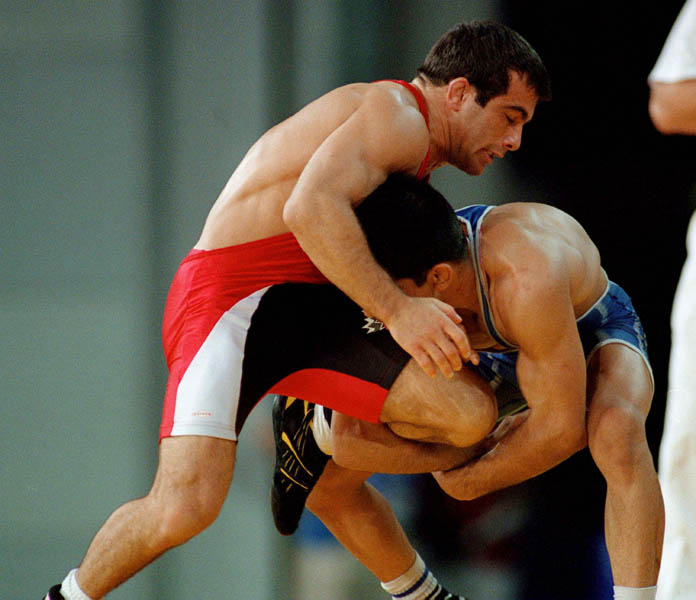 Canada's Guivi Sissaouri competes in a wrestling match at the Sydney 2000 Olympic Games. (CP PHOTO/ COA)