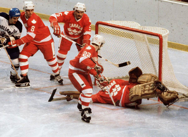 Canada's Don Spring (8), John Devaney (15), Stelio Zupancich (22) and Paul Pageau (goalie) participate in hockey action against the Netherlands at the 1980 Winter Olympics in Lake Placid. (CP PHOTO/ COA/ )