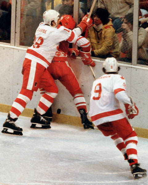 Canada's Dan D'Avise (left) and Glenn Anderson (right) participate in hockey action against the U.S.S.R. at the 1980 Winter Olympics in Lake Placid. (CP Photo/ COA)