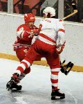 Canada's Warren Anderson (2), Dan D'Alvise (18) and Stelio Zupancich (22) compete in hockey action against the U.S.S.R. at the 1980 Winter Olympics in Lake Placid. (CP Photo/ COA)