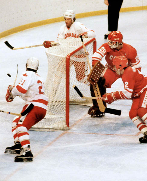 Canada's Kevin Primeau (21) and John Devaney (behind) compete in hockey action against the U.S.S.R. at the 1980 Winter Olympics in Lake Placid. (CP Photo/ COA)