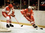 Canada's John Devaney (centre) participate in hockey action against the Netherlands at the 1980 Winter Olympics in Lake Placid. (CP Photo/ COA)