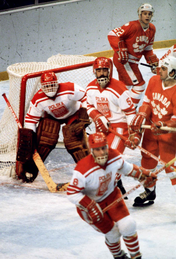 Team Canada competes in hockey action against Poland at the 1980 Winter Olympics in Lake Placid. (CP Photo/ COA)